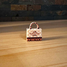 Load image into Gallery viewer, Co@ch Tan & Brown Purse Silicone Focal Beads