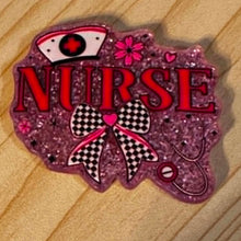 Load image into Gallery viewer, Nurse with B&W Bow Pink Glittery Flatback