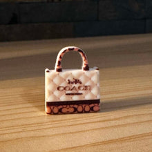 Load image into Gallery viewer, Co@ch Tan & Brown Purse Silicone Focal Beads