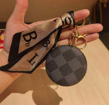 Load image into Gallery viewer, PU Leather Double-Sided Fashion Vintage Pattern Mirror Keychain

