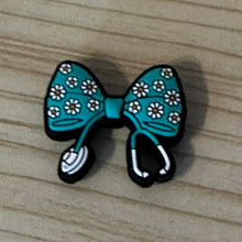 Load image into Gallery viewer, Tiffany Blue with Daisies Nurses Ribbon Silicone Focal Bead
