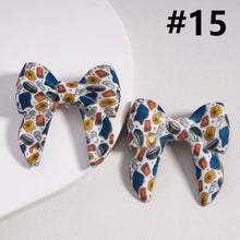 Load image into Gallery viewer, 3D Cartoon Printed Bow Silicone Focal Beads 40*40mm - 15 Different Prints
