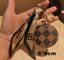 Load image into Gallery viewer, PU Leather Double-Sided Fashion Vintage Pattern Mirror Keychain
