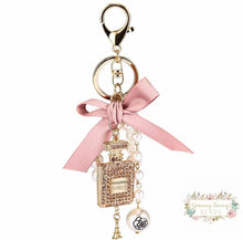 Load image into Gallery viewer, Diamond-Studded Perfume Bottle Keychain Bow Pearl Handmade Pendant Luxury Designer Keychain Charm Keychain
