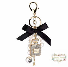 Load image into Gallery viewer, Diamond-Studded Perfume Bottle Keychain Bow Pearl Handmade Pendant Luxury Designer Keychain Charm Keychain
