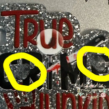 Load image into Gallery viewer, HAS A DEFECT - True Crime Glitter Flatback - has two spots on it Glitter Flatback
