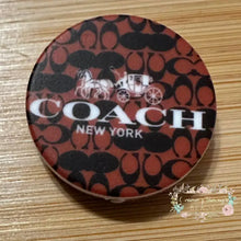 Load image into Gallery viewer, SILICONE FOCAL BEAD - Co*ch Brown Round Silicone Focal Bead
