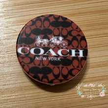 Load image into Gallery viewer, SILICONE FOCAL BEAD - Co*ch Brown Round Silicone Focal Bead
