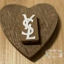 Load image into Gallery viewer, YSL - Brown PVC - Focal Bead - One Count Silicone Focal Bead
